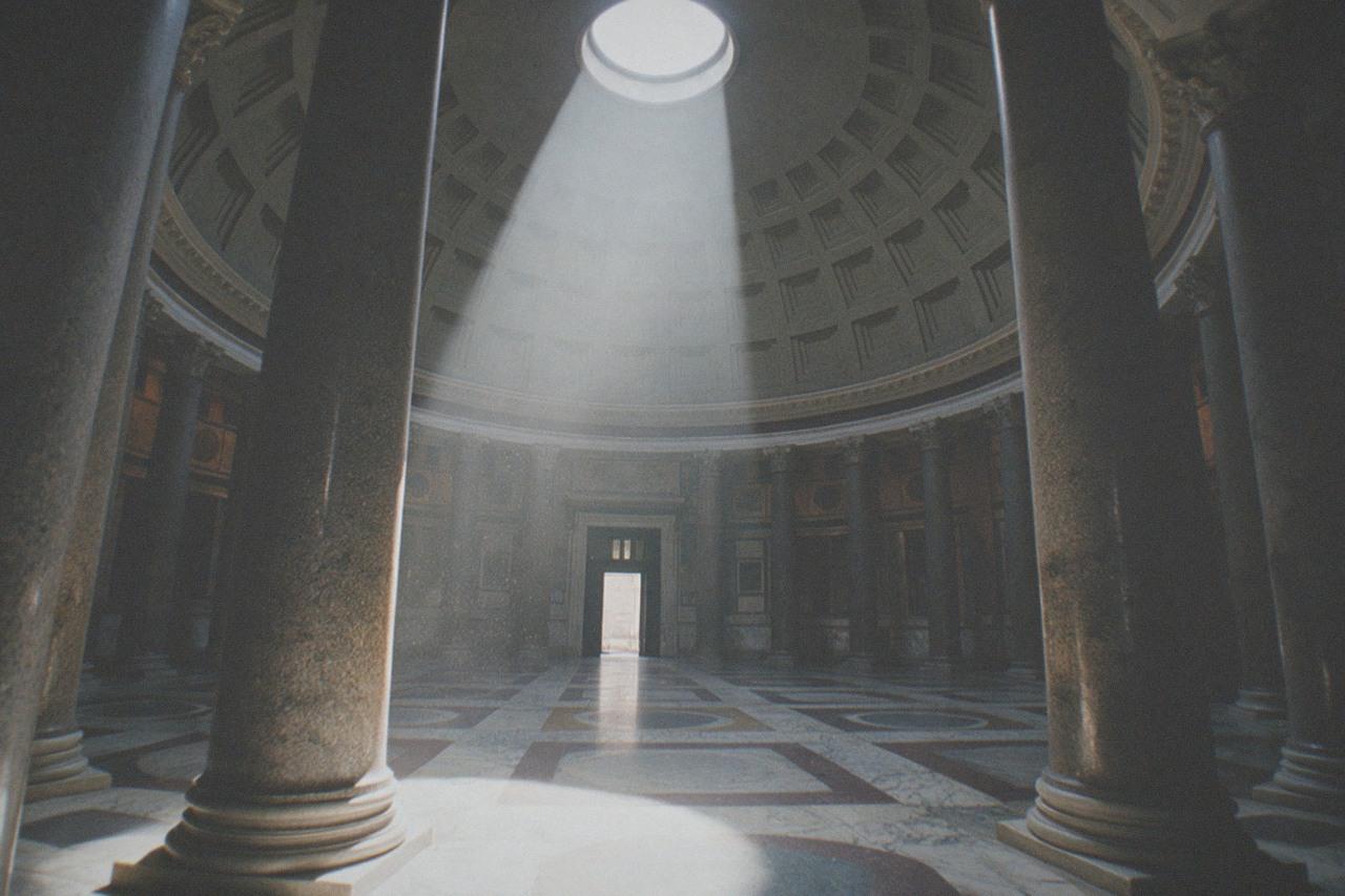 The interior of the Pantheon in Rome with light falling through the oculus onto the marble floor